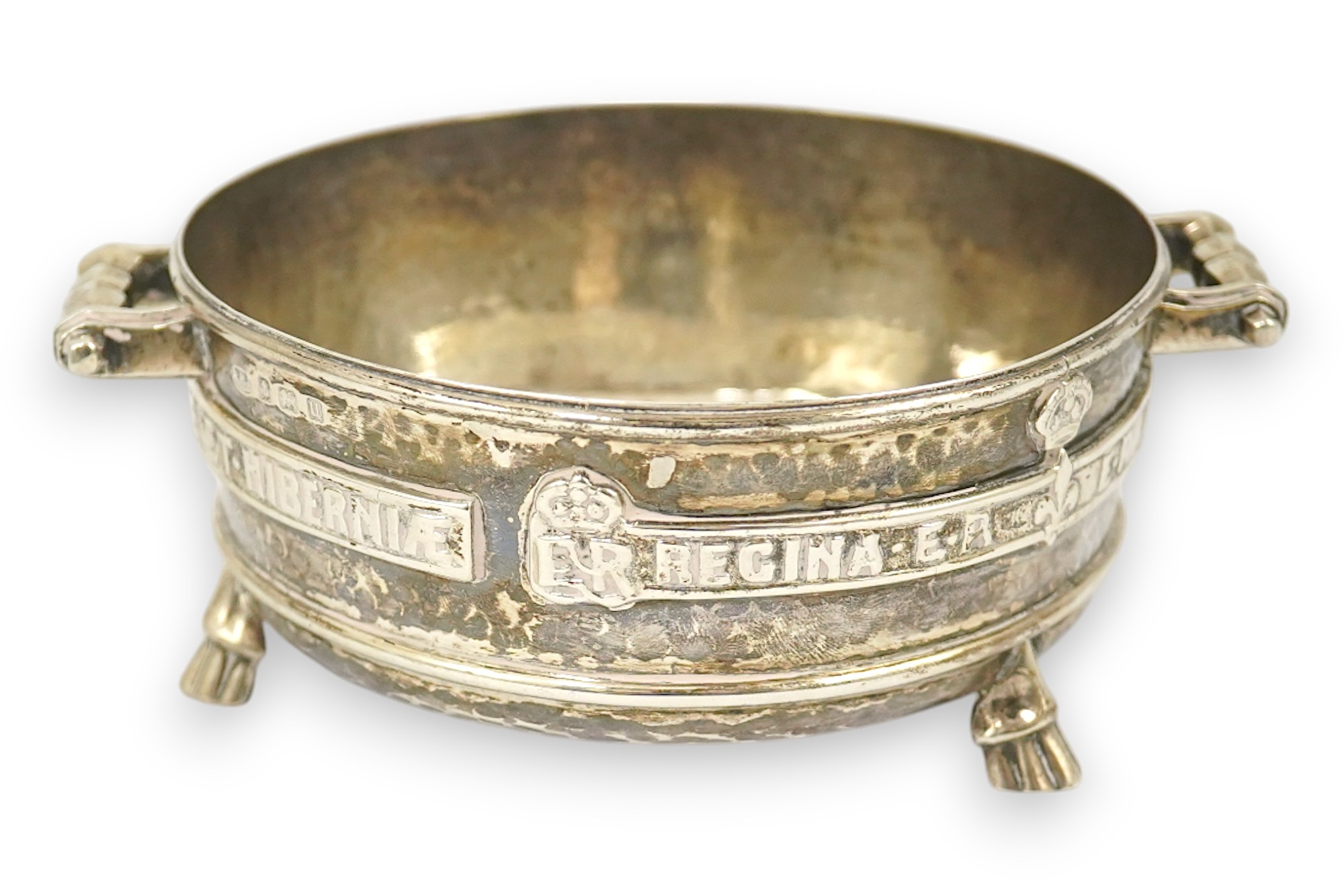 A George V Arts & Crafts planished silver replica of a late 15th century Winchester Bushel measure, by Albert Edward Jones